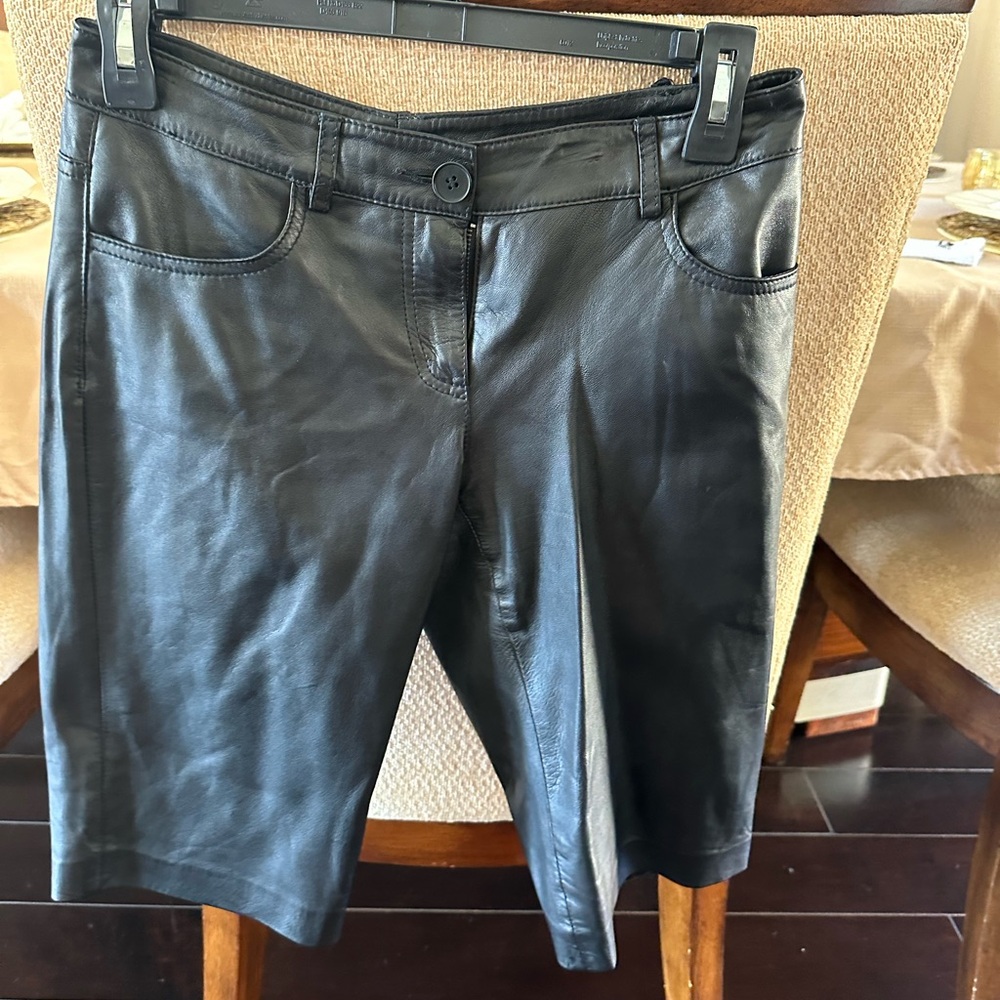 Women’s black leather shorts, size 2